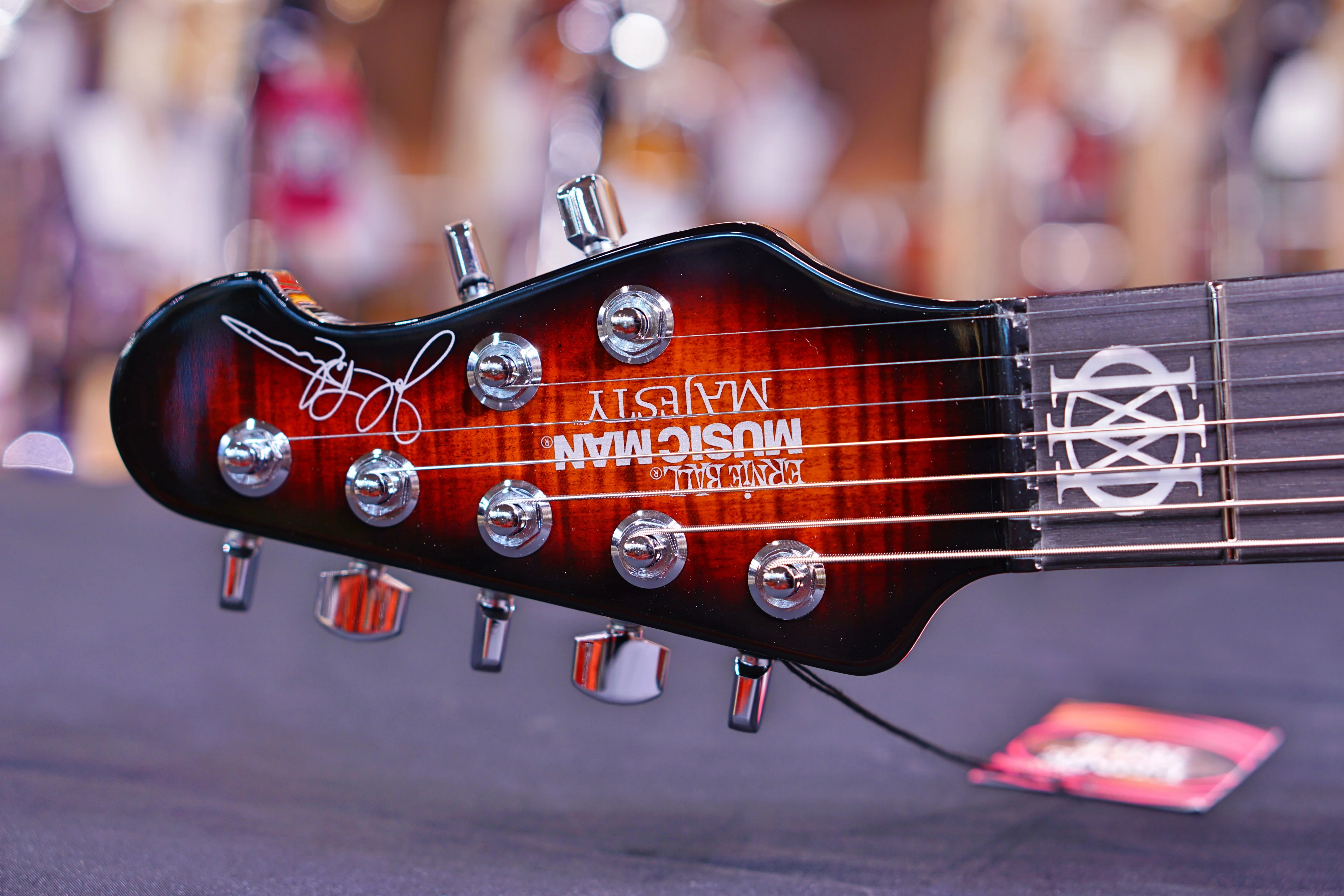 Ernie Ball Music Man John Petrucci Majesty 7 - Tiger Eye M12200 - Image 7